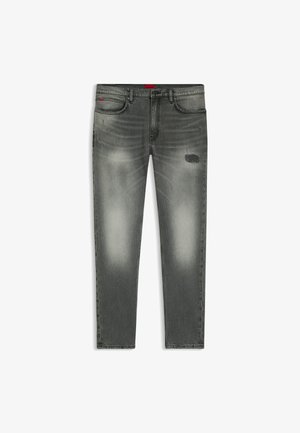 Slim-fit grey jeans with faded areas and a small distressed patch on the right thigh, featuring front pockets and belt loops.