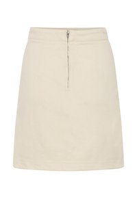 Jupe mini en coton beige avec une forme A-line simple, dotée d'une fermeture éclair centrée à l'arrière et de détails de couture minimaux.
