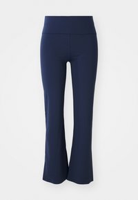Pantalone tamnoplave boje s ravnim fitom od rastezljivog materijala s širokim pojasom. Glatka tekstura i bez vidljivih uzoraka ili metalnih detalja.