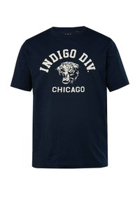 Marineblå kortærmet t-shirt lavet af bomuld, med et hvidt grafisk tryk af en brølende tiger og tekst: "INDIGO DIV. CHICAGO."