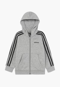 Grijze rits hoodie met een capuchon, zwarte strepen op de mouwen, voorzakken en het "adidas" logo op de borst. Zachte stofstructuur.