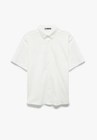 Kortærmet skjorte med krave i off-white med et subtilt tekstureret stribemønster og knaplukning foran. Har en afslappet pasform.