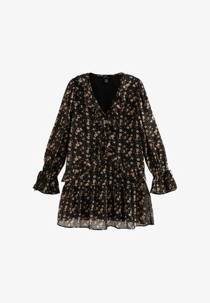 Zwarte blouse met bloemenprint, lange mouwen, een V-hals en ruches. Het materiaal is licht en heeft een vloeiende zoom met kleine bloemenpatronen in beige en oranje.