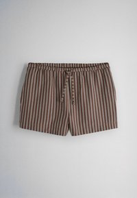 Brown shorts with white vertical stripes and a front drawstring on a plain gray background.