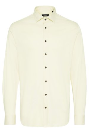 Langarmshirt van lichtgeel stof, met een klassieke kraag en donkerbruine knopen aan de voorkant voor contrast.