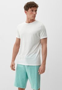 s.Oliver Pantaloni sportivi - helles türkis