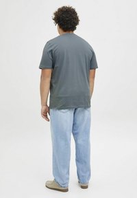 Jack & Jones Triko s potiskem - stormy weather