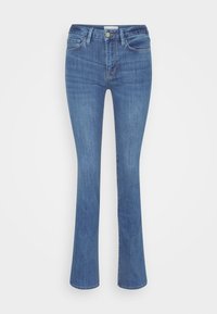Jeans de mezclilla azul acampanados con una cintura de altura media. Cuenta con cinco bolsillos, un cierre de botón y una textura suave. Color uniforme en toda la prenda.