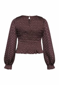 Langærmet mørk lilla bluse med hvide prikker, smocket talje og ryg, nøglehulsknaplukning og flæsekant.