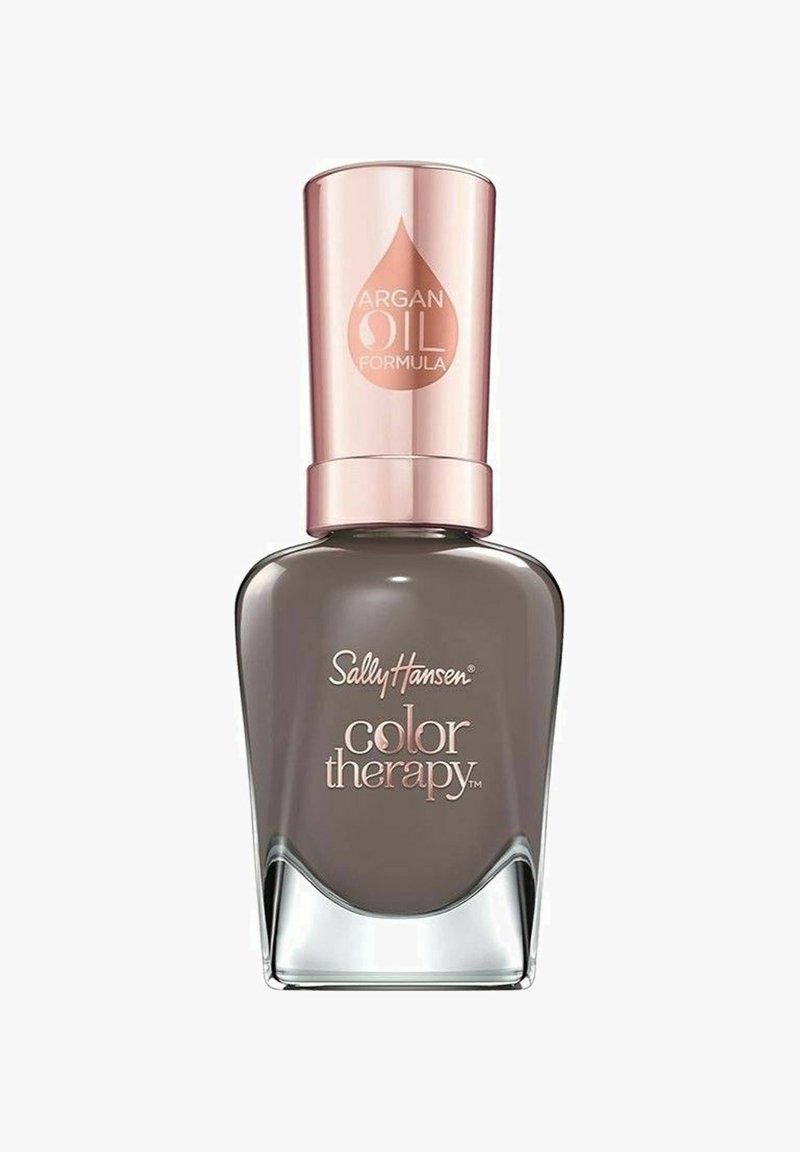 Kynsiäntö ohuessa lasipullossa, jossa on metallinhohtoinen ruusukultainen korkki. Sisältää tumman taupen värin ja kohokuvioidun logon etupuolella.