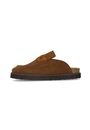 Brown suede slip-on clog with a dark sole, open back, and a strap detail across the top.