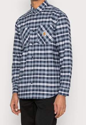 Blauwe en witte geruite overhemd met lange mouwen van katoen, met twee borstzakken, een button-down kraag en een logo patch aan de linkerkant.