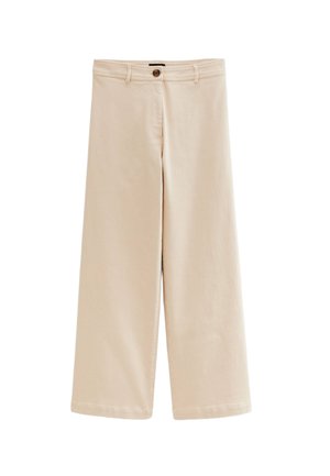 Pantalons larges beiges en coton, dotés d'une fermeture à bouton, de poches avant et d'une texture lisse. Sans motifs ni embellissements.