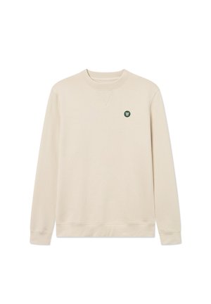 Beige sweatshirt with a round neckline, long sleeves, and a small green logo on the left chest. Fabric is smooth with a soft texture.