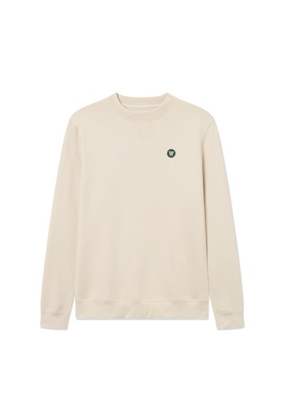 Beige Sweatshirt mit rundem Ausschnitt, langen Ärmeln und einem kleinen grünen Logo auf der linken Brust. Der Stoff ist glatt mit einer weichen Textur.