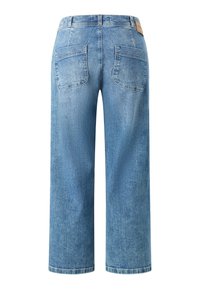 Light blue denim trousers with a wide-leg cut, featuring two back pockets and a waistband label. The texture appears smooth and slightly faded.