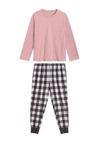 Różowa bluzka z długim rękawem w połączeniu z czarno-białymi piżamowymi spodniami w kratkę, z elastycznym paskiem i zwężanymi nogawkami. Miękki materiał.