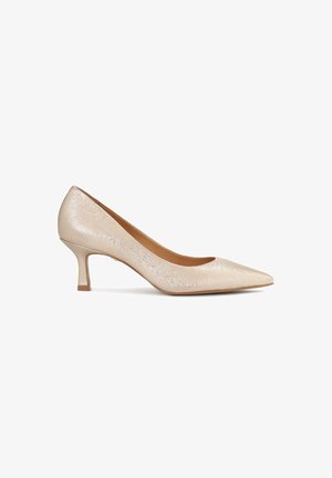 Beige metallic pointed-toe pump with a low, block heel. Smooth texture with subtle shimmer and a classic design for versatility.