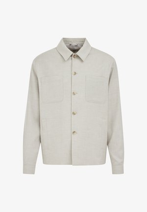 Helebeež pikkade varrukatega nööbitav särk, millel on kaks rinnataskut, terav krae ja sirge alumine äär.