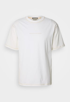 White cotton t-shirt with short sleeves, featuring a subtle logo in light beige at the chest, and contrasting stitching along the seams.