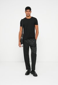 HUGO TEAGAN - Pantaloni - black