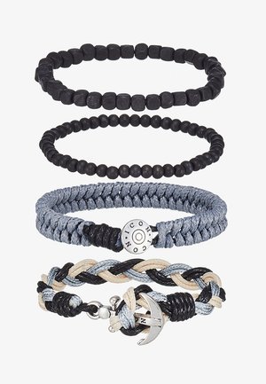 Set of four bracelets: two black bead styles, braided gray and black cord, and a braided multi-colored cord with an anchor charm.