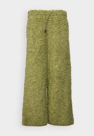 Grüne, flauschige Hosen mit weitem Bein, einer strukturierten Oberfläche und einem Kordelzugbund. Der Stoff ist weich und leicht flauschig.