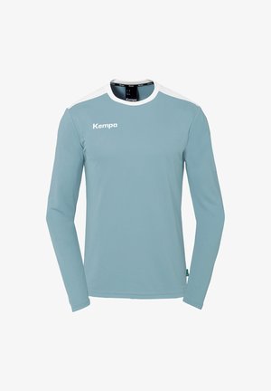 Lange mouwen sportshirt in lichtblauw met witte accenten. Gemaakt van lichte stof, met een ronde kraag en het 'Kempa'-logo in het wit.