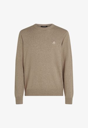 Beige crew-neck sweater lavet af blødt stof. Ribbet manchetter og kant. Har et lille logo på brystet. Enkel design, let tekstur.