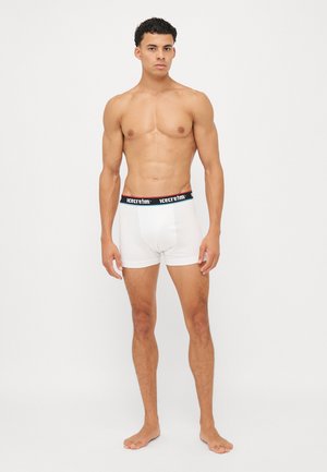 White boxer shorts with a black waistband featuring red text. The shorts have a snug fit and a smooth, cotton-like texture.