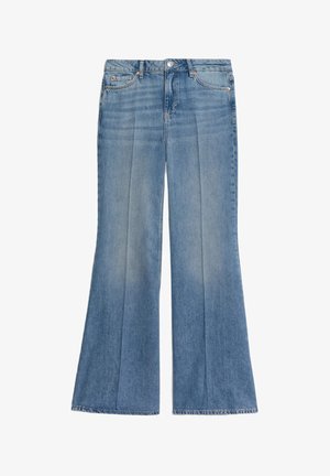 Light blue denim flared jeans with a high waist, featuring front pleats, a zip fly, and visible stitching along the hem. Classic five-pocket design.
