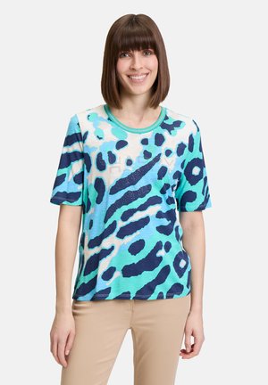 T-shirt a manica corta con un motivo leopardato blu e turchese, scollatura tonda e un dettaglio con la scritta "HAPPY" decorato con strass.