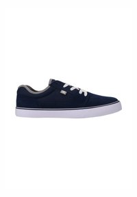 Navy blue sneakers featuring a suede upper, white laces, and a white rubber sole with subtle gray accents and a low-profile design.