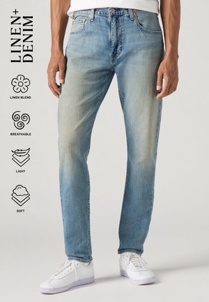 Jeans Tapered Fit - light-blue denim