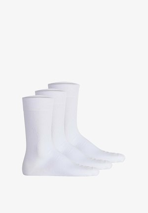 Three pairs of white cotton socks with ribbed cuffs, a smooth texture, and a crew length design. No patterns or additional accents.