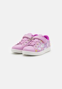 Pink sneakers with a smooth synthetic texture, featuring colorful cloud and unicorn graphics, Velcro strap closure, and white rubber sole.