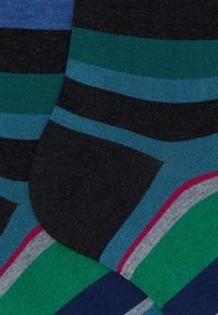 Striped socks featuring blue, green, and black bands. Soft knit texture with contrasting colors and a smooth finish.