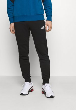 AMPLIFIED PANTS - Tracksuit bottoms - black