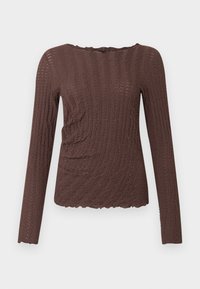 Καφέ μακρυμάνικη μπλούζα με υφή κυματιστού μοτίβου, κυματιστά τελειώματα και εφαρμοστή γραμμή με ραμμένες πιέτες στο πλάι.