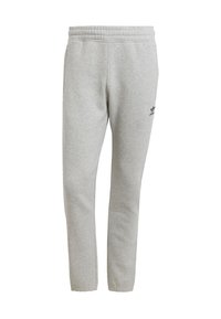 Šedé tepláky vyrobené z měkké látky, s tapered designem a elastickým páskem, s malým černým logem na levé nohavici.