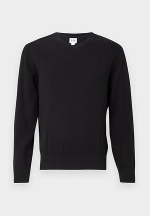 Suéter preto de gola em V com mangas longas, feito de tecido suave. Apresenta punhos e barra canelados, com etiqueta da marca dentro do colarinho. Ajuste padrão.