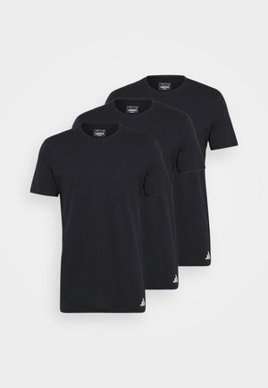 T-shirts de algodão pretos, de gola redonda e mangas curtas. Apresentam detalhe do logotipo na barra. Três peças mostradas, planas e dispostas de forma ordenada, sem rugas visíveis.