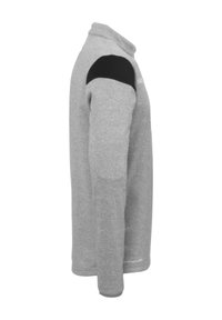 Grauer Langarm-Sweatshirt mit hohem Kragen und einem schwarzen Schulterpatch. Weicher Stoff, abgerundeter Saum und dezente Branding-Details.