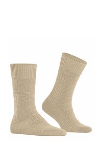 Calze a maglia beige con polsini a coste e strisce testurizzate, realizzate in materiale morbido di spessore medio e finitura liscia.