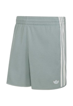 Světlounce zelené sportovní šortky s elastickým pasem, bílými třemi pruhy po stranách a malým logem Adidas na levé noze.