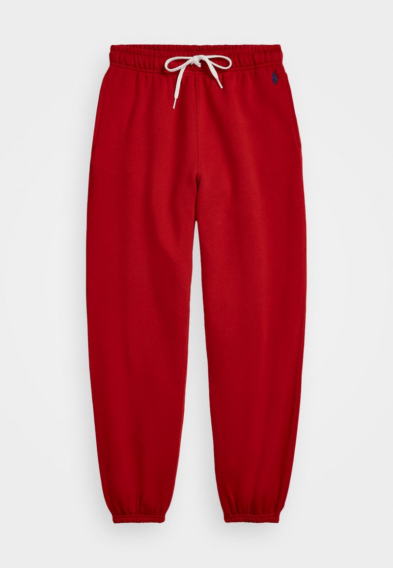 Röda sweatpants i mjukt material, med elastisk midja och vit dragsko, elastiska muddar och en liten logotyp på vänster ben.