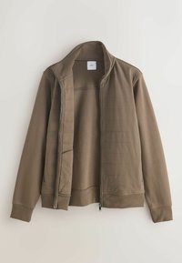 Ruda zip-up striukė su siuvinėta priekinė dalimi, minkšta medžiaga, stovintis apykaklė ir šoninės kišenės. Tinkama kasdieniniam dėvėjimui, lengva konstrukcija.