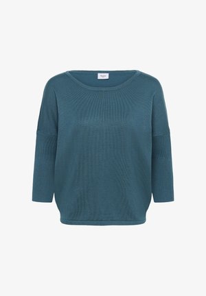 Pull en teal avec une coupe ample, texture côtelée, large encolure ronde et manches 3/4. Étiquette de marque "Saint" cousue au niveau de l'encolure.