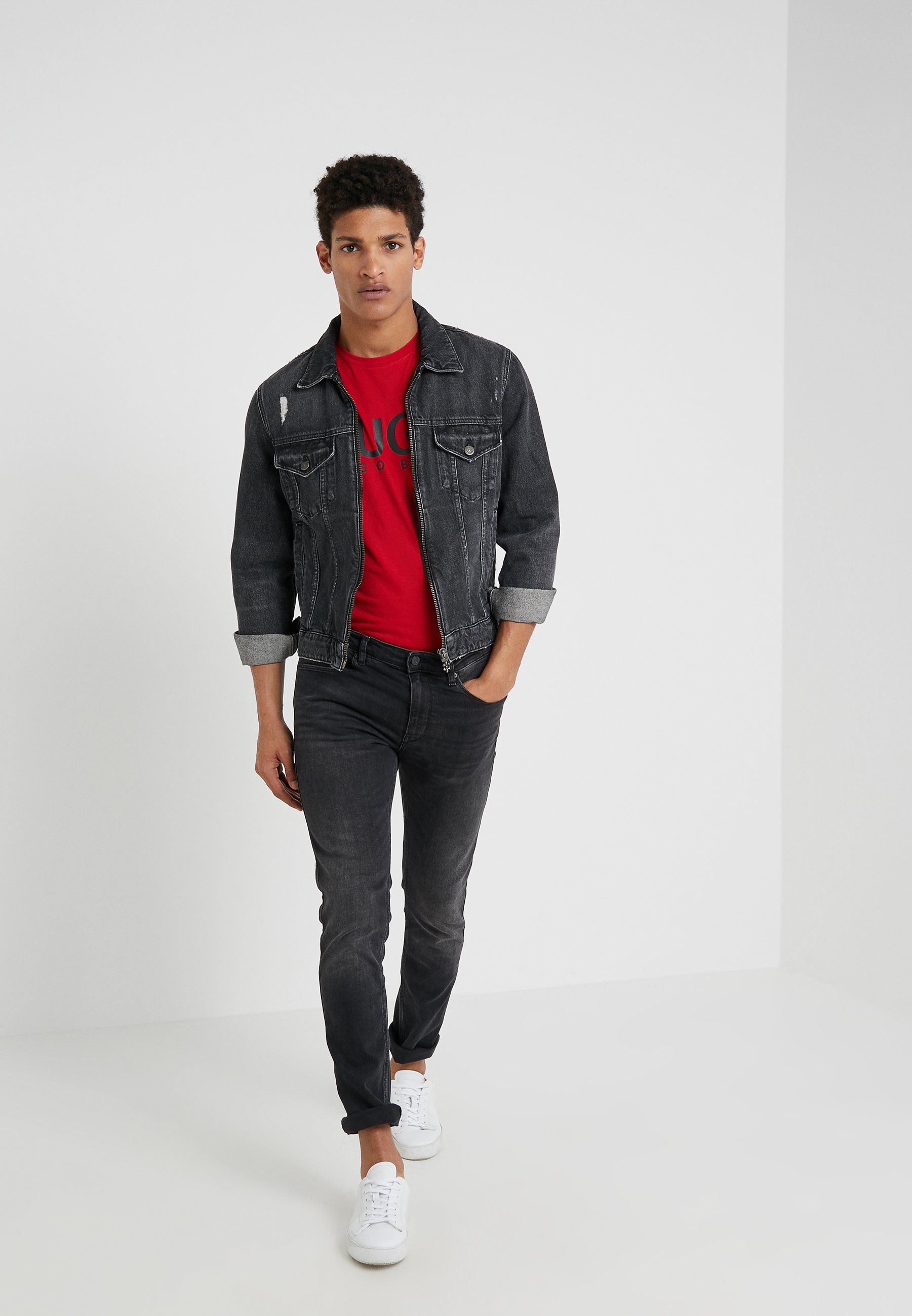 grey jacket red shirt