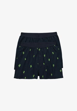 Boxers en coton bleu marine avec un motif de cactus vert, dotés d'une taille élastique et d'une braguette à boutons pour une fermeture sécurisée.